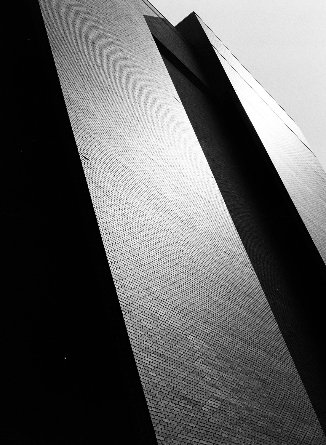 A black-and-white architectural photograph shot on Tri-X 320. The concrete surfaces keep a wide range of tones.